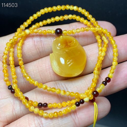 天然蜜蜡琥珀吊坠 坠重2.7克 8.7/21/25毫米左右总重5.3克 价格85