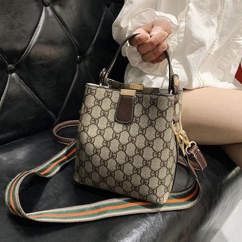 古琦酷奇包包女时尚水桶包个性斜挎包休闲女包百搭ins宽带手提包