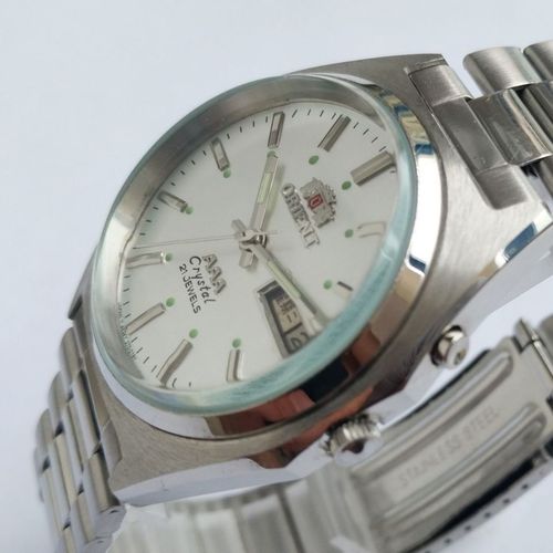 日本东方老双狮3a手表男士双历全自动机械表精钢防水夜光复古表