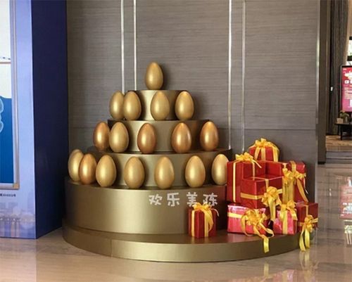 高档地产售楼部砸金蛋开布置 商蛋台业金场桌砸金蛋台氛围摆奢华
