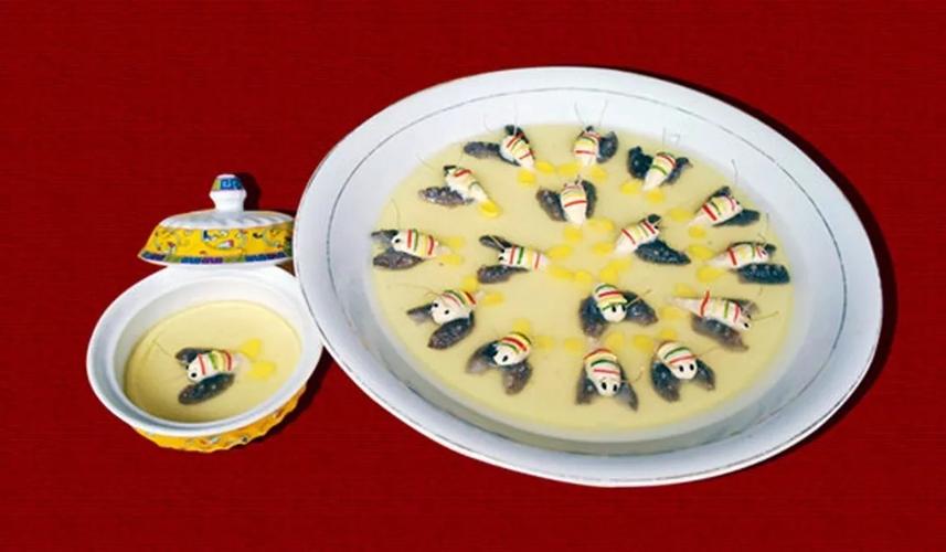 清汤芙蓉蝴蝶海参和连年有余两道吉祥菜肴