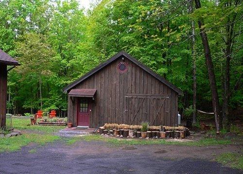 romantic country barn by the stream
