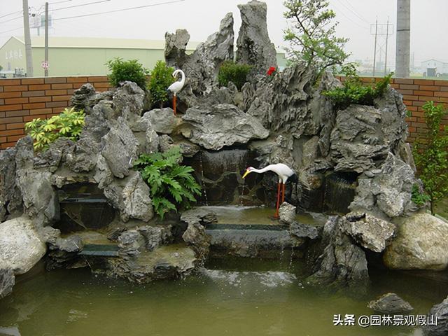 庭院鱼池假山效果图
