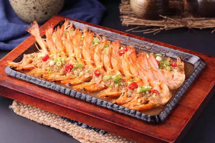yi bai wan yi  铁板开背虾  大虾从后背切开一分为二,然后去掉虾线