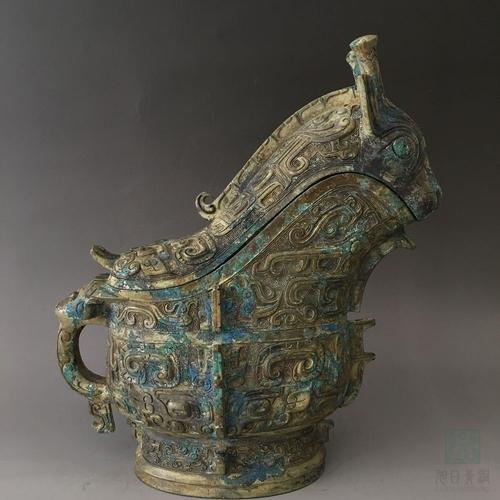 青铜器-商代后期兽面纹觥