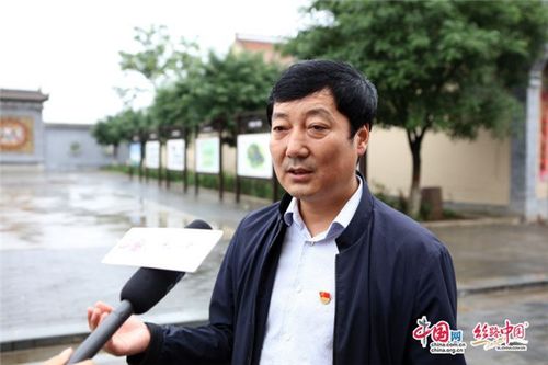 凤翔县城关镇党委书记王晓锋说"要让文化符号"活起来"".贺冬鹏/摄