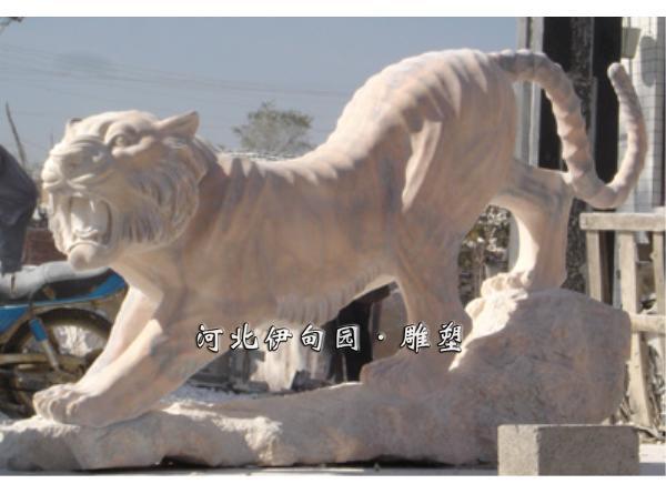 由河北伊甸园园林雕塑公司,专业设计雕刻,动物石雕,老虎,伊甸园雕塑