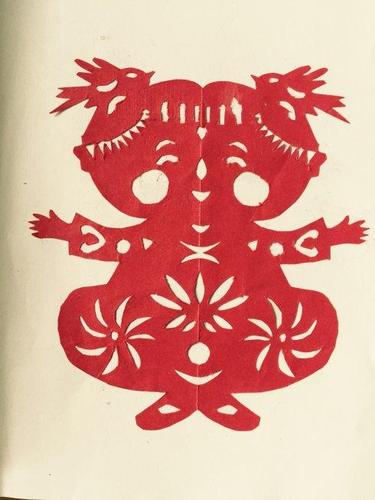 剪纸中的抓髻娃娃