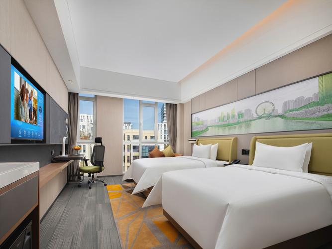 酒店客房延续希尔顿欢朋整体轻快,活泼风格,没有繁杂的装饰,显得自然