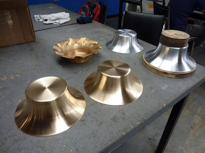 科技  数控旋压成形是利用数控车削中心来实现旋压所需的各种运动轨迹