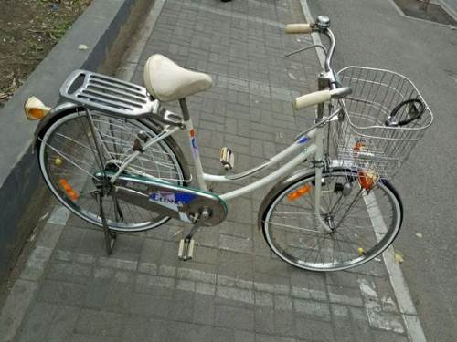 日本老宫田要的叫我—沈阳摩托电动自行车   