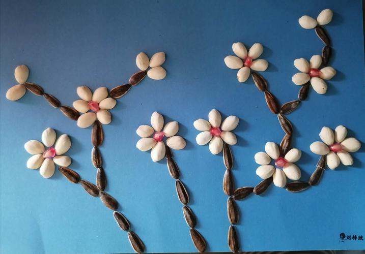 用瓜子,石榴,开心果壳做梅花