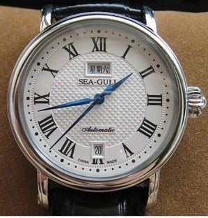 海鸥手表m185s 罗马表盘网上买不会有假的吧?