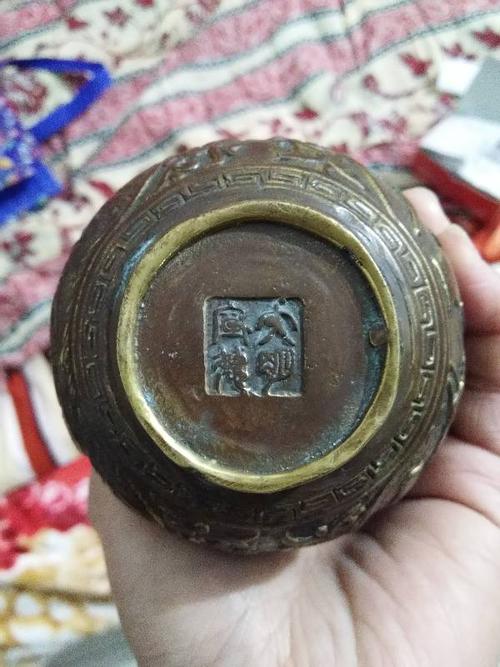 我的大明宣德铜葫芦如何分辨真假?请行家帮我看看并估个价