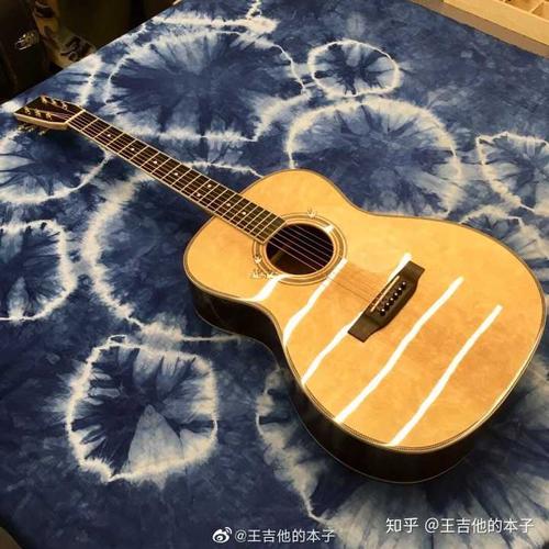 舍友2万8的吉他我不小心砸了一个小坑,应该赔他多少钱
