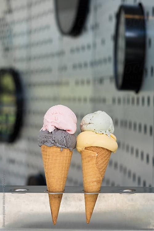 double ice cream scoops in waffle cones