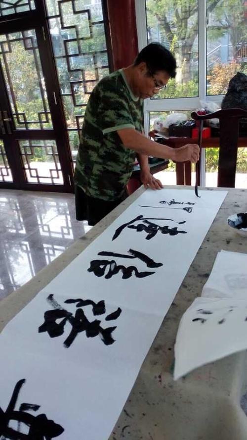 中国书法协会副会长"张崇德"少将给公司题词