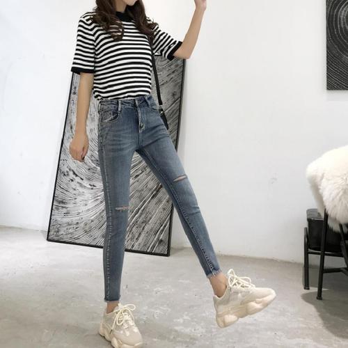 轻奢世家2021春夏新款破洞牛仔裤女韩版显瘦高腰紧身小脚女装九分裤