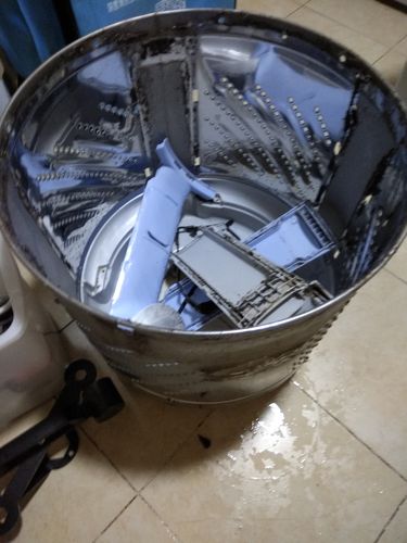 荣事达rg-l6503bs洗衣机储存衣服洗下来的脏东西在哪个位置,要怎么