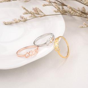 欧美创意款情人节饰品 唯美心心相连玫瑰金钛钢戒指 女性潮流配饰