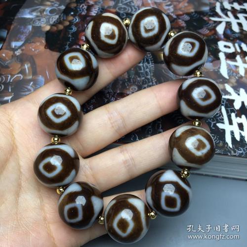 藏传古珠老料高油包浆金刚三眼天珠手链尺寸20毫米11颗