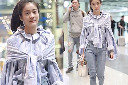 【图】张雪迎机场现身穿搭时尚 微博晒照表情超可爱