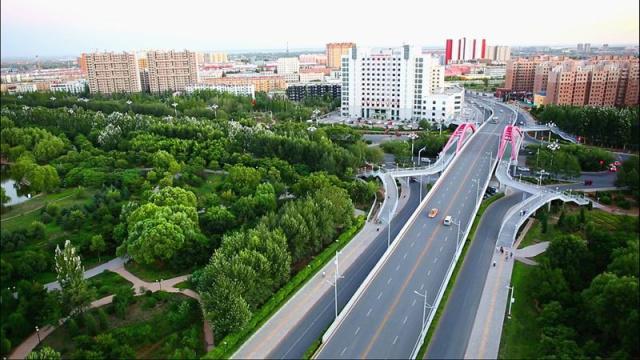 从"进城"到"融城"九原区向中心城区华美蝶变
