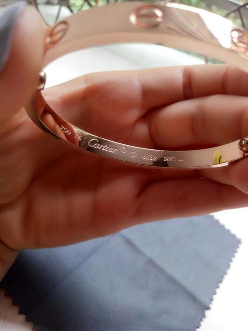 朋友送的750 16卡地亚手镯ip6688星001a是真是假?