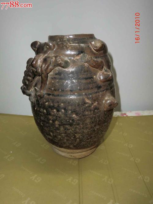 珍贵的博物馆收藏级宋代四川捏塑龙纹黑釉谷仓罐