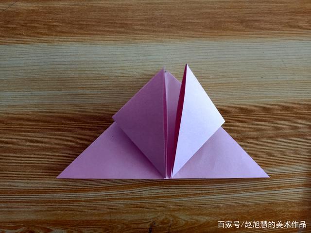 三角形的两个底角向上折