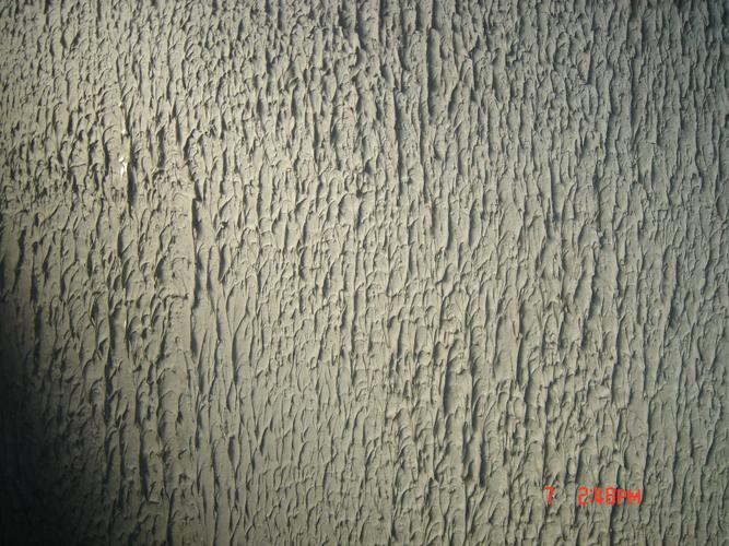 从墙面拉毛看装修队是否规矩