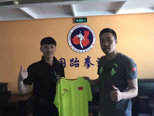 ▌李长利(左)与中国跆拳道国家队主教练