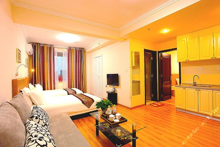 青岛鑫龙假日酒店式公寓(行政三人套房)