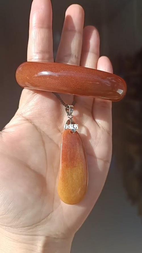 新疆金丝玉杜热红籽料手镯,带金沙,招财_手镯_吉木萨尔鼎盛商务酒店