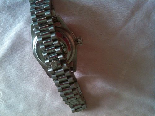 我有一块rolex女表,请帮忙鉴定下这劳力士的真假!