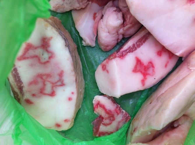 买的整猪.切开看到肥肉上有血圈,吓人.请高手帮忙看下 是不是病猪肉