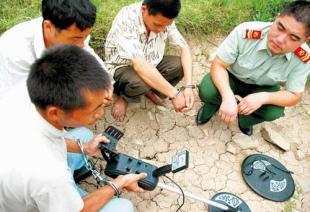 我国约10万盗墓者游走各地 所盗文物3天即出境
