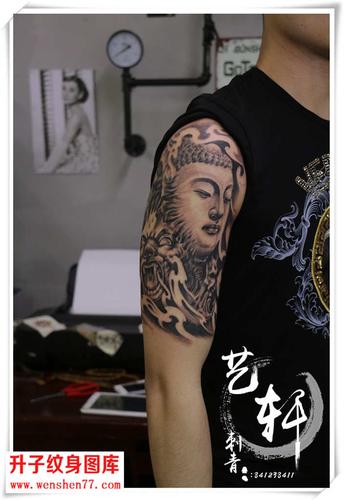 手臂佛纹身图案