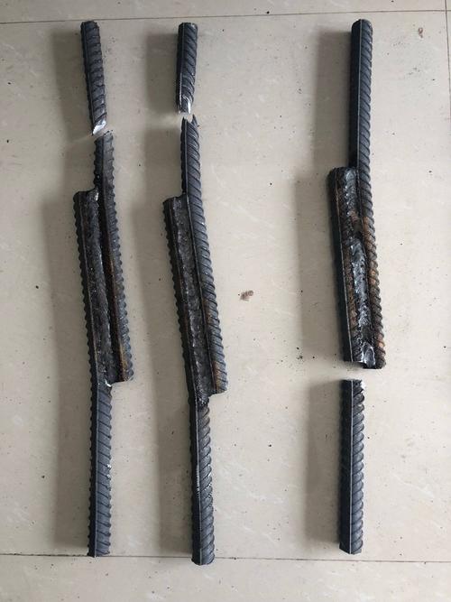 4,总监办试验监理人员对钢筋焊接件进行试验检测.