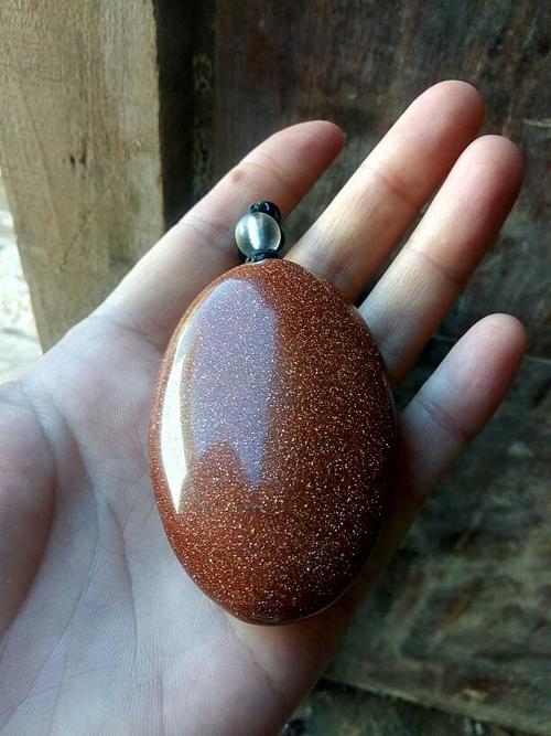 麻烦懂得人告诉我,这是天然的金沙石吗?谢谢