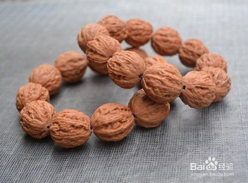 山桃核手串怎么养红