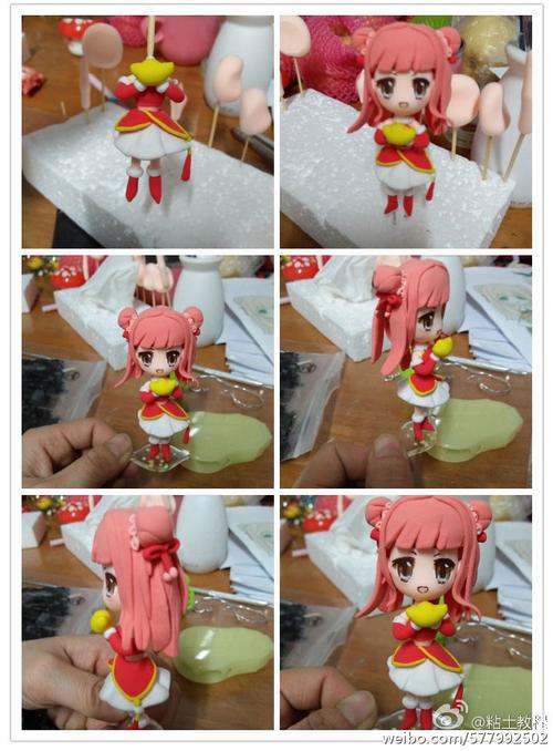 抱着小元宝的可爱粘土小姑娘