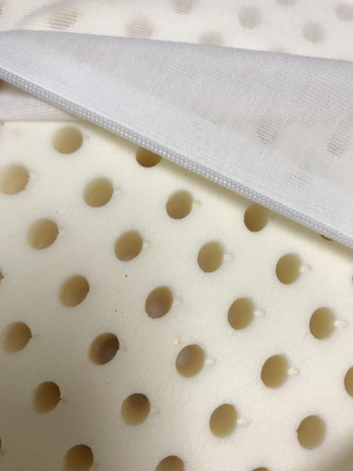 你好,前段时间买了个儿童乳胶枕,能帮我看看真假吗?谢谢
