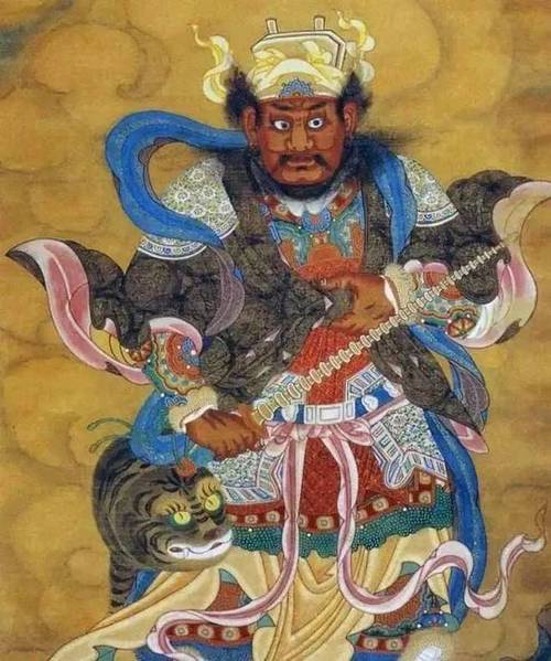 武财神,旧时年画中,他形象多为头戴铁冠,手持宝鞭,黑面浓须,身跨黑虎