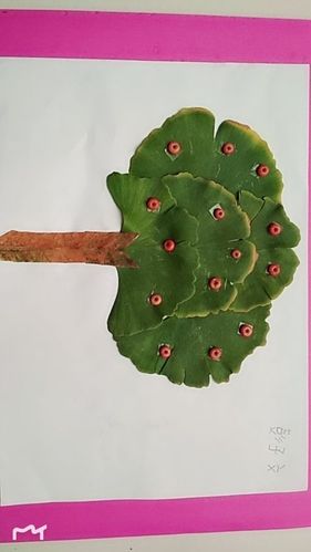 喜乐泉幼儿园:"亲子手工"树叶创意粘贴画