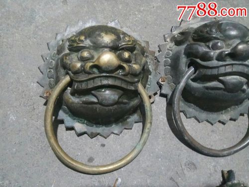 铜狮子门环一对