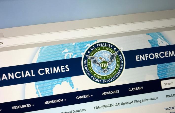 in first, fincen penalizes bitcoin trader for violating aml laws