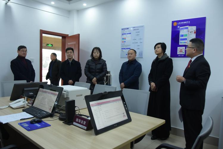 11月26日,信阳市司法局党组书记,局长徐晓,基层科科长张培培