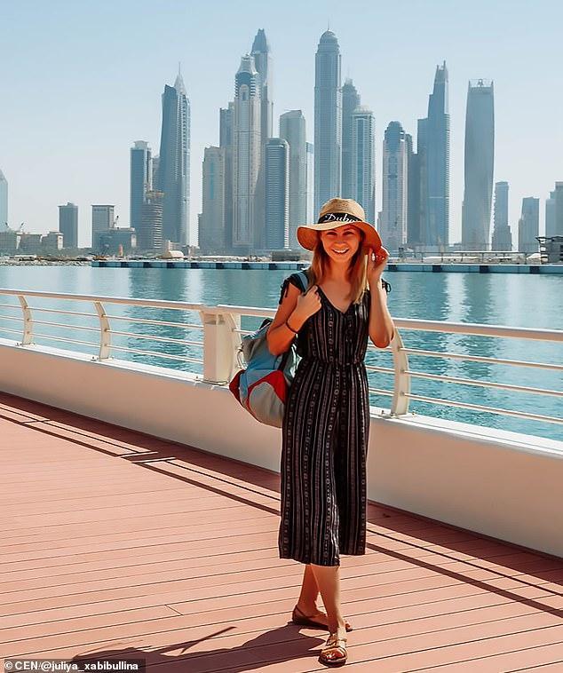 迪拜放宽封锁令,俄美女享受生活悬崖边拍美照,一个跄踉香消玉殒