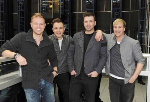 右二为西城男孩westlife中的歌手马克